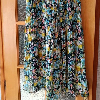 Pantalon fluide plissé jambes larges à motif fleur 